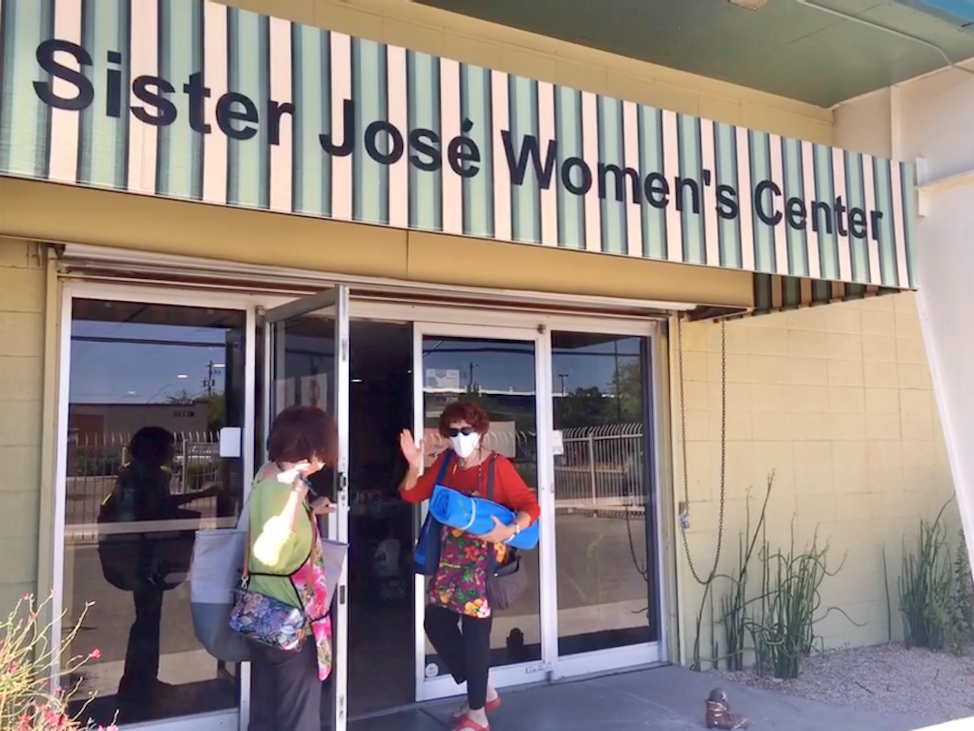 Fireman sisters in front of Sister Jose Women's Center