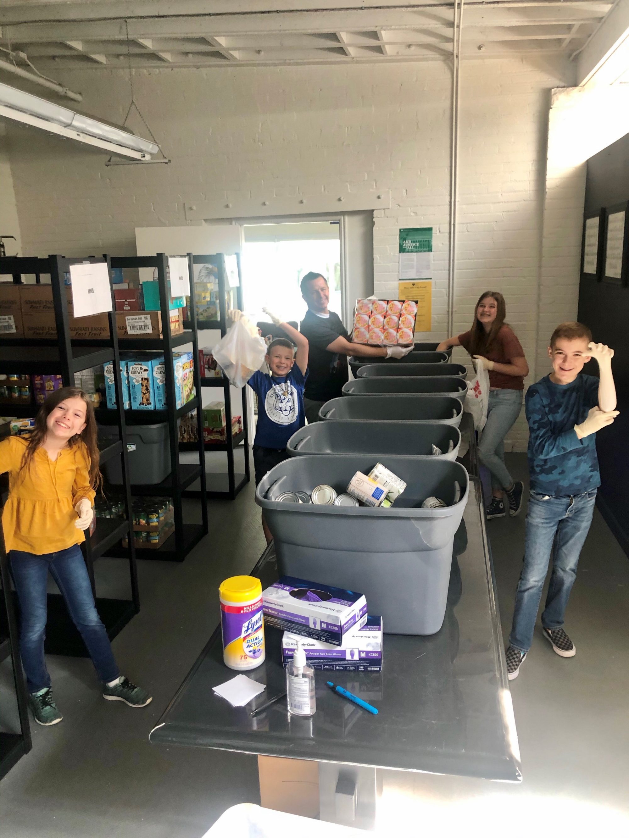 Middleberg packing food into boxes