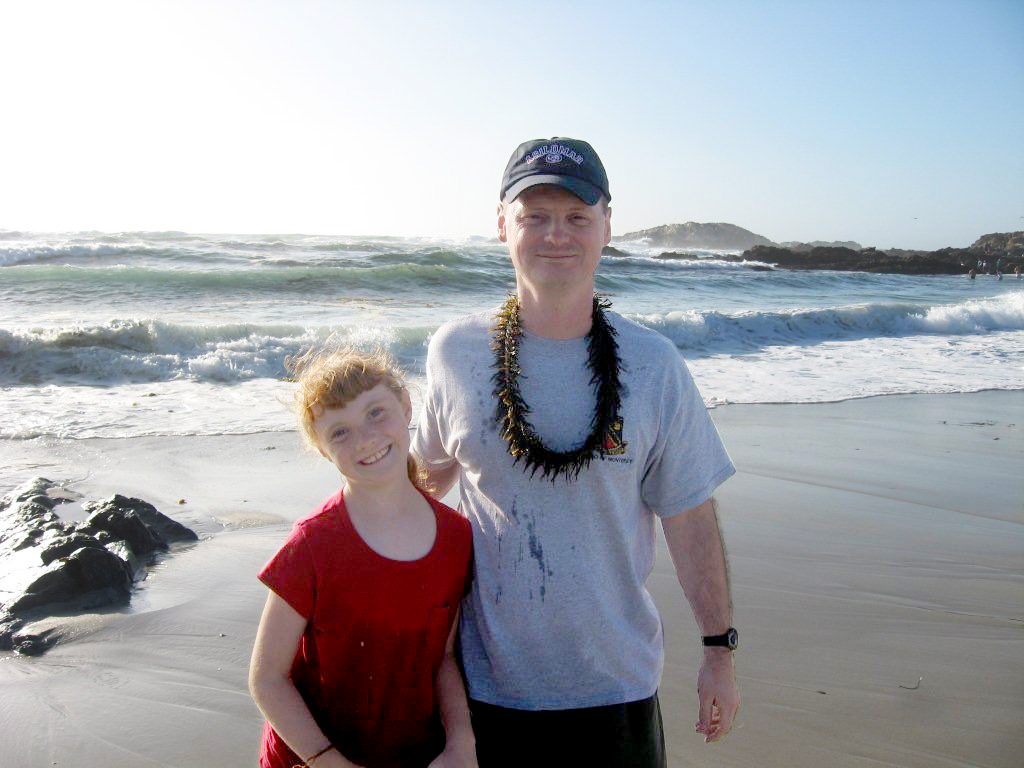 Photo  of Alison and dad on beach