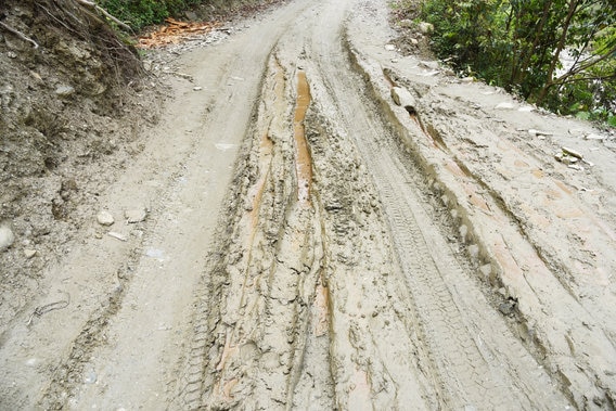A muddy road after a flood