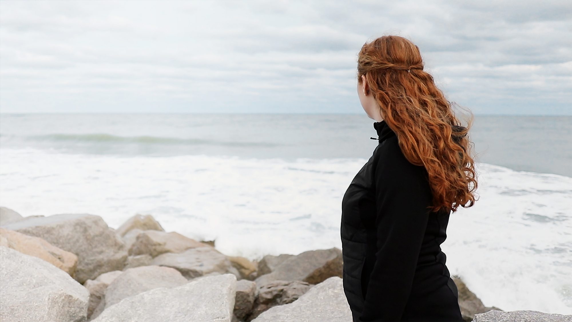 Fidelity Charitable donor looking out at the ocean