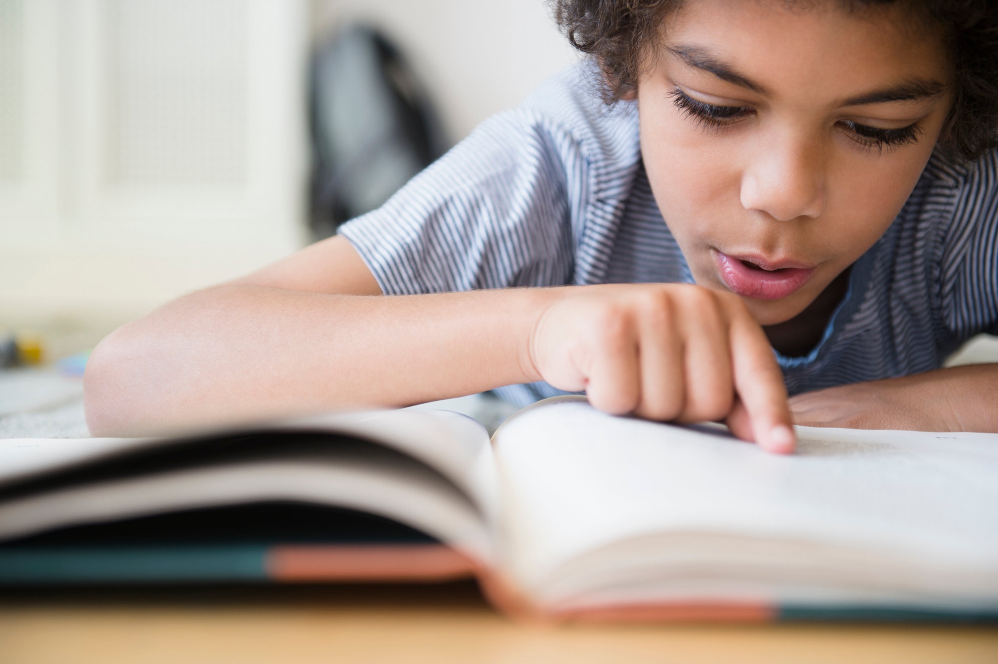 Boy reading book
