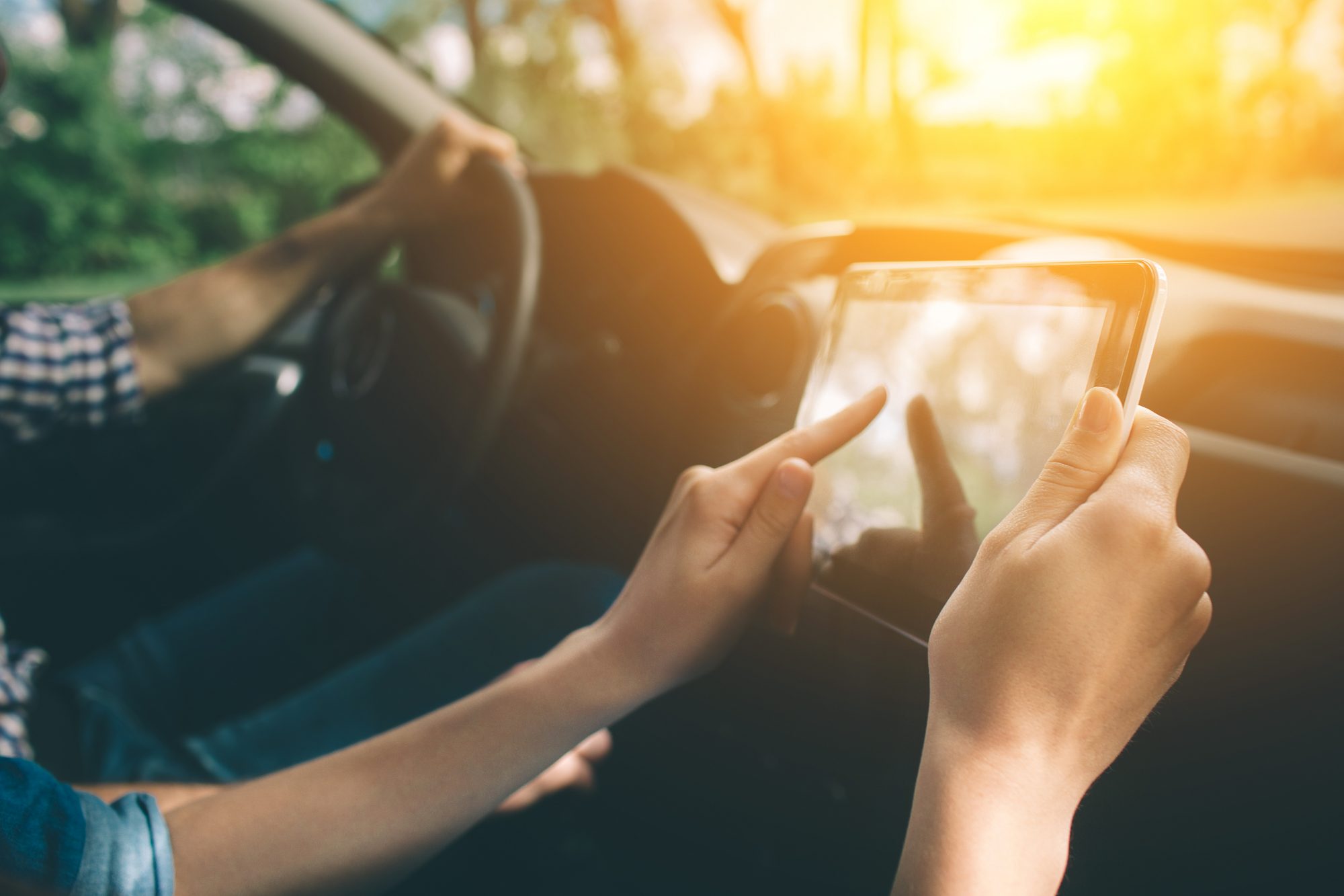 Couple using a GPS as naviagation