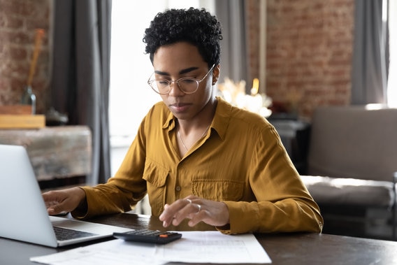 woman using tools and calculators