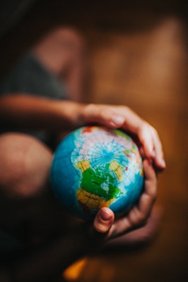 World globe being held in hands