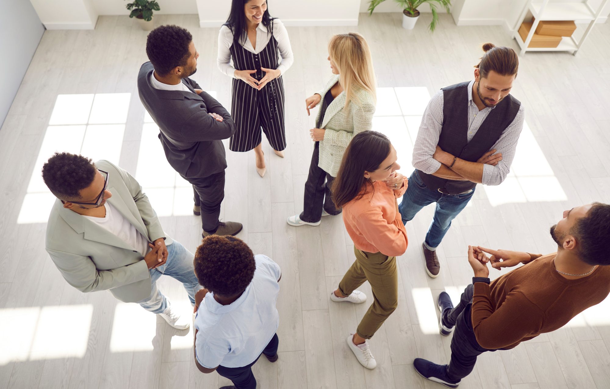 Group of diverse people communicating at business event