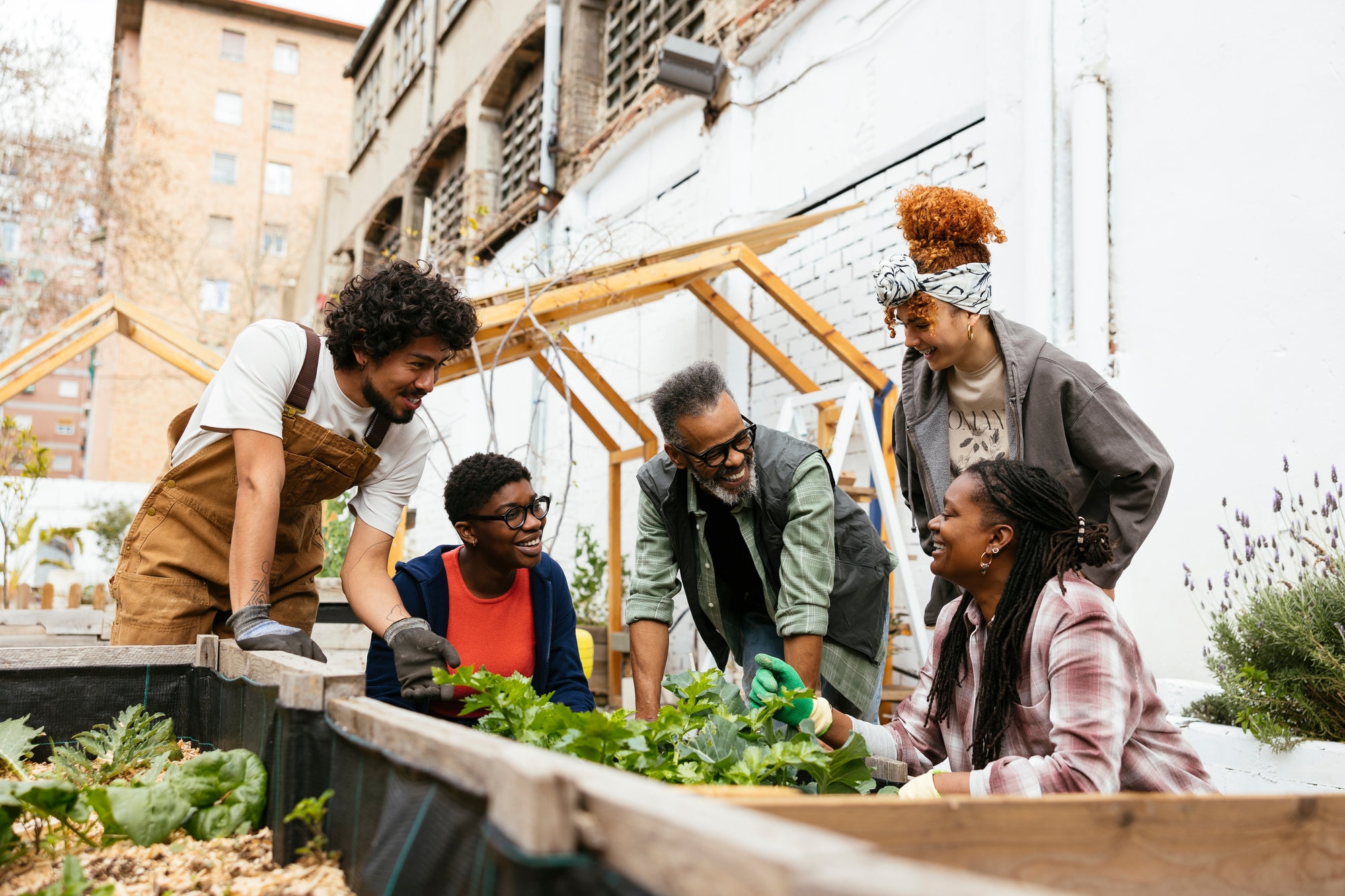 Group of volunteers in community garden.