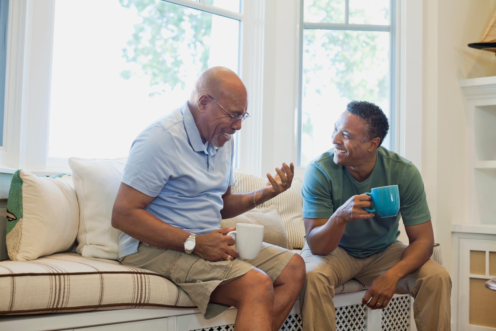 Father and son laughing together