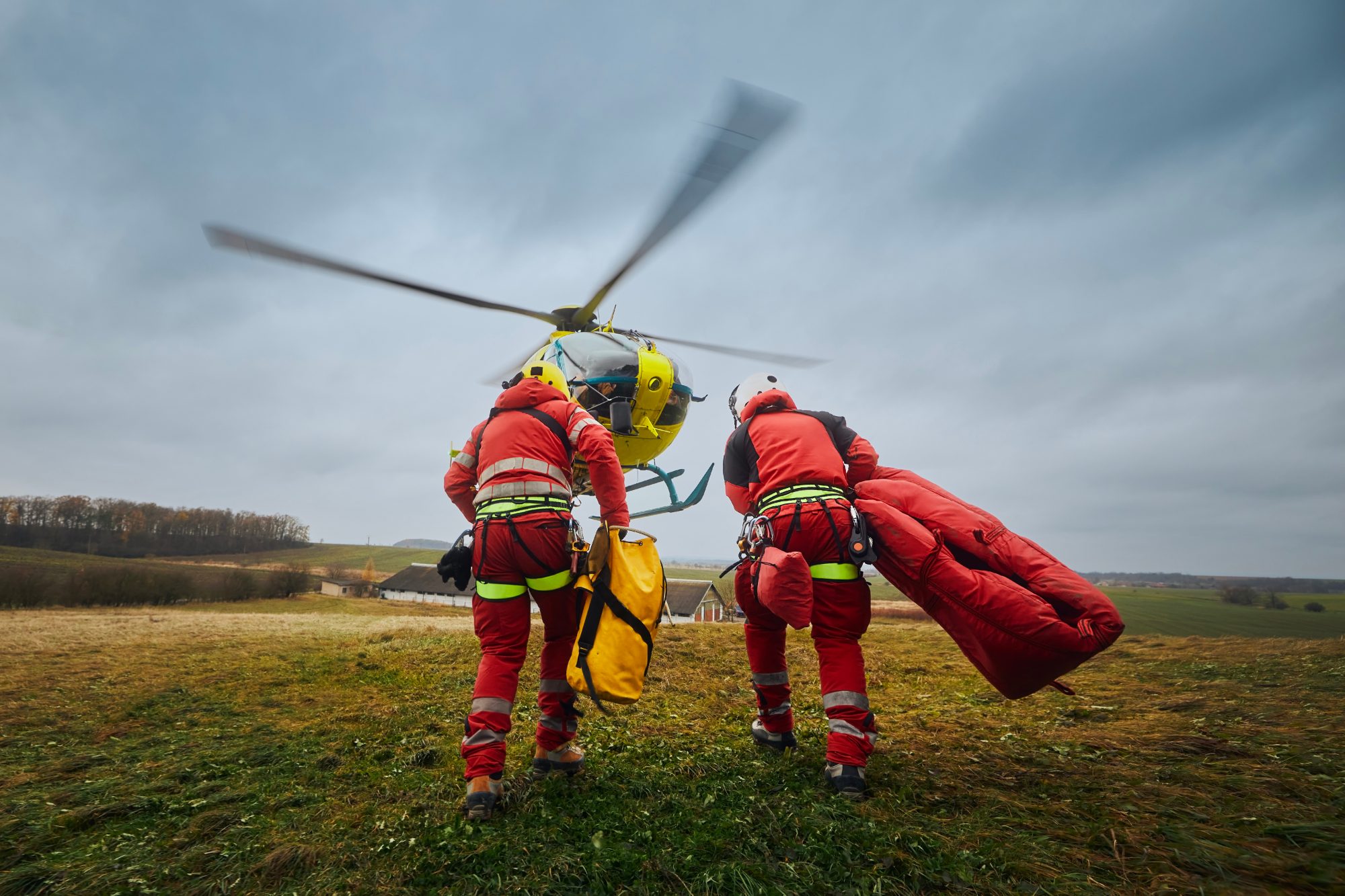 Paramedics running to helicopter