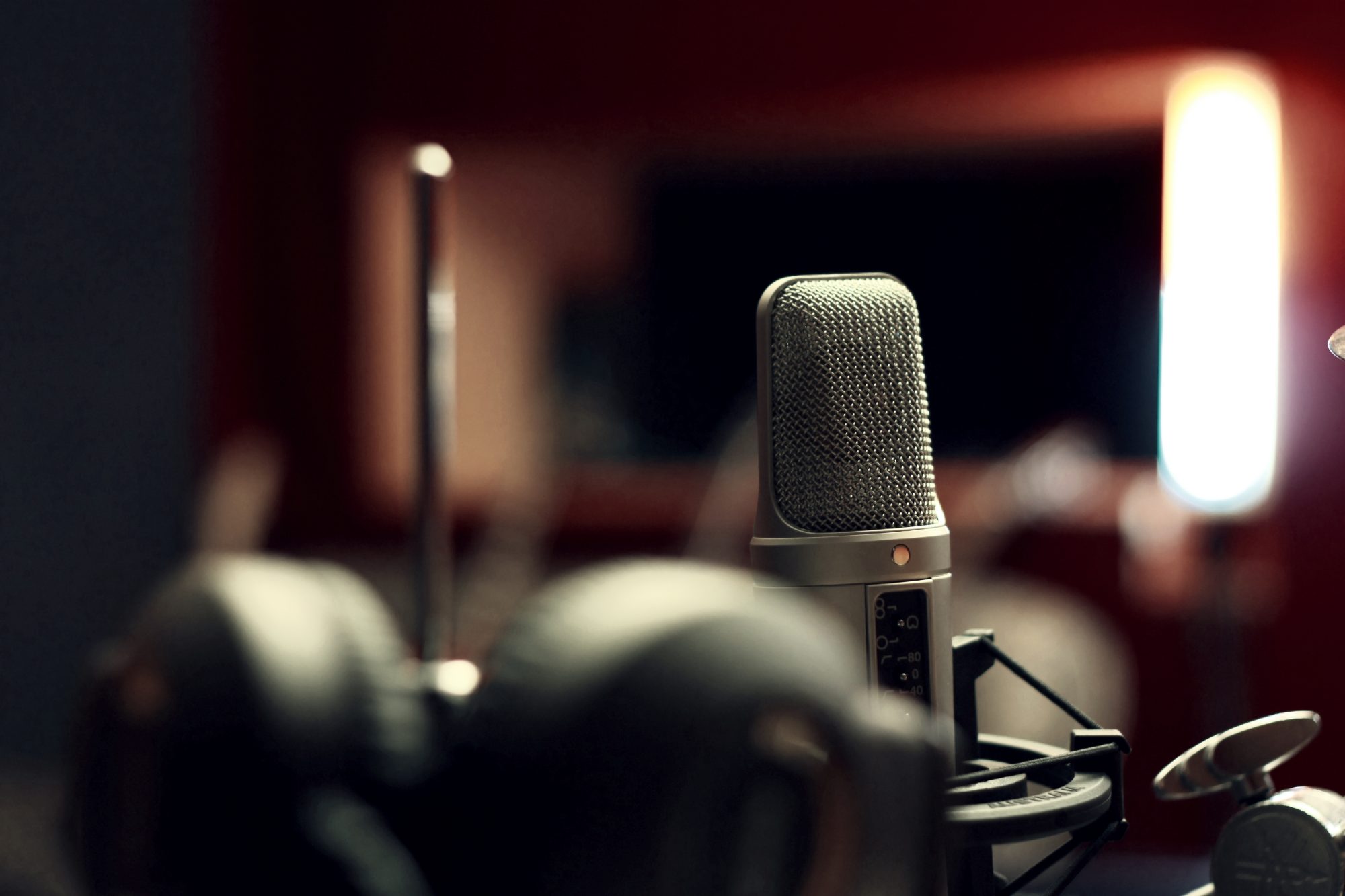 Arts and culture sector represented by inside a recording studio for public radio.