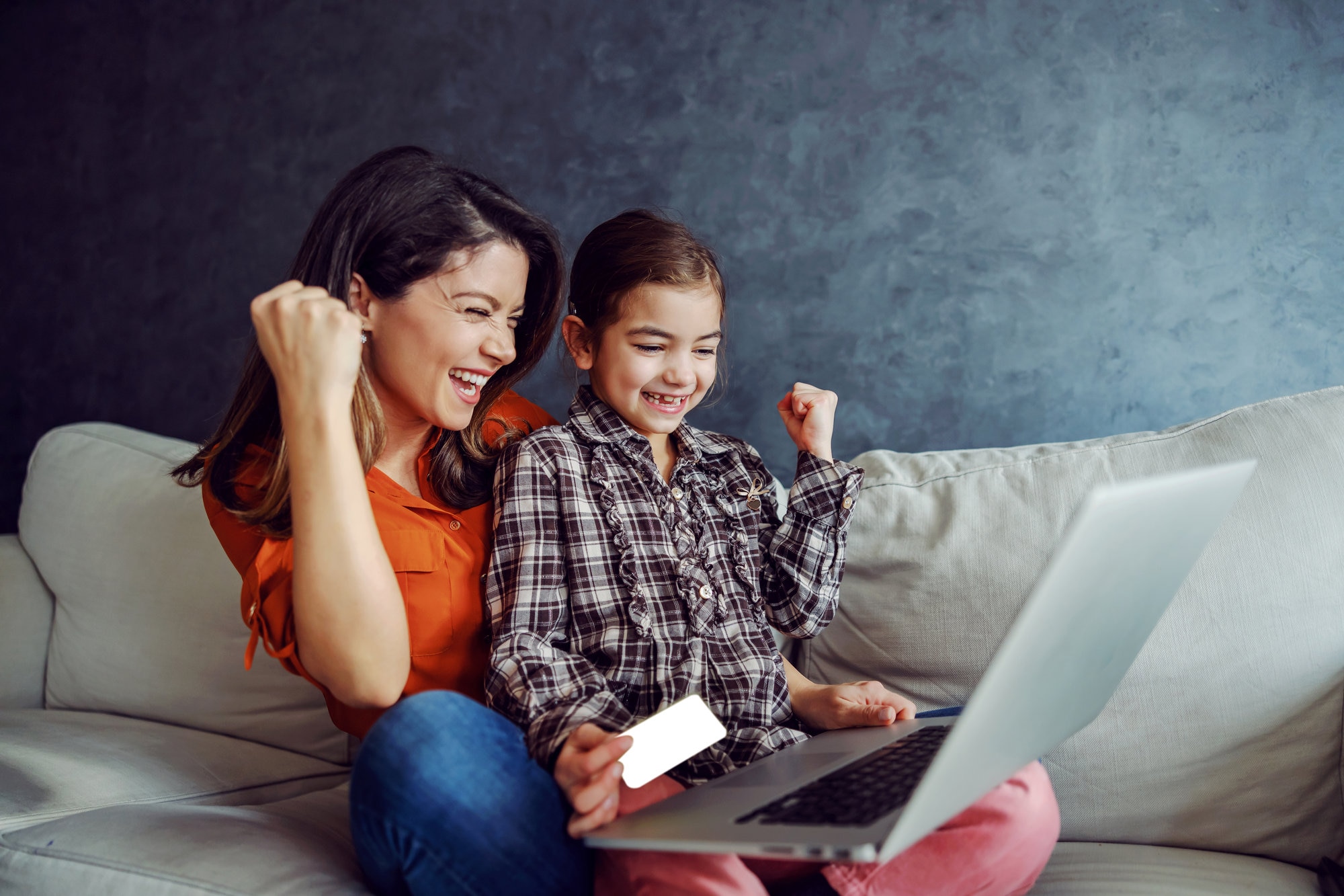 Woman child celebrating donating money online