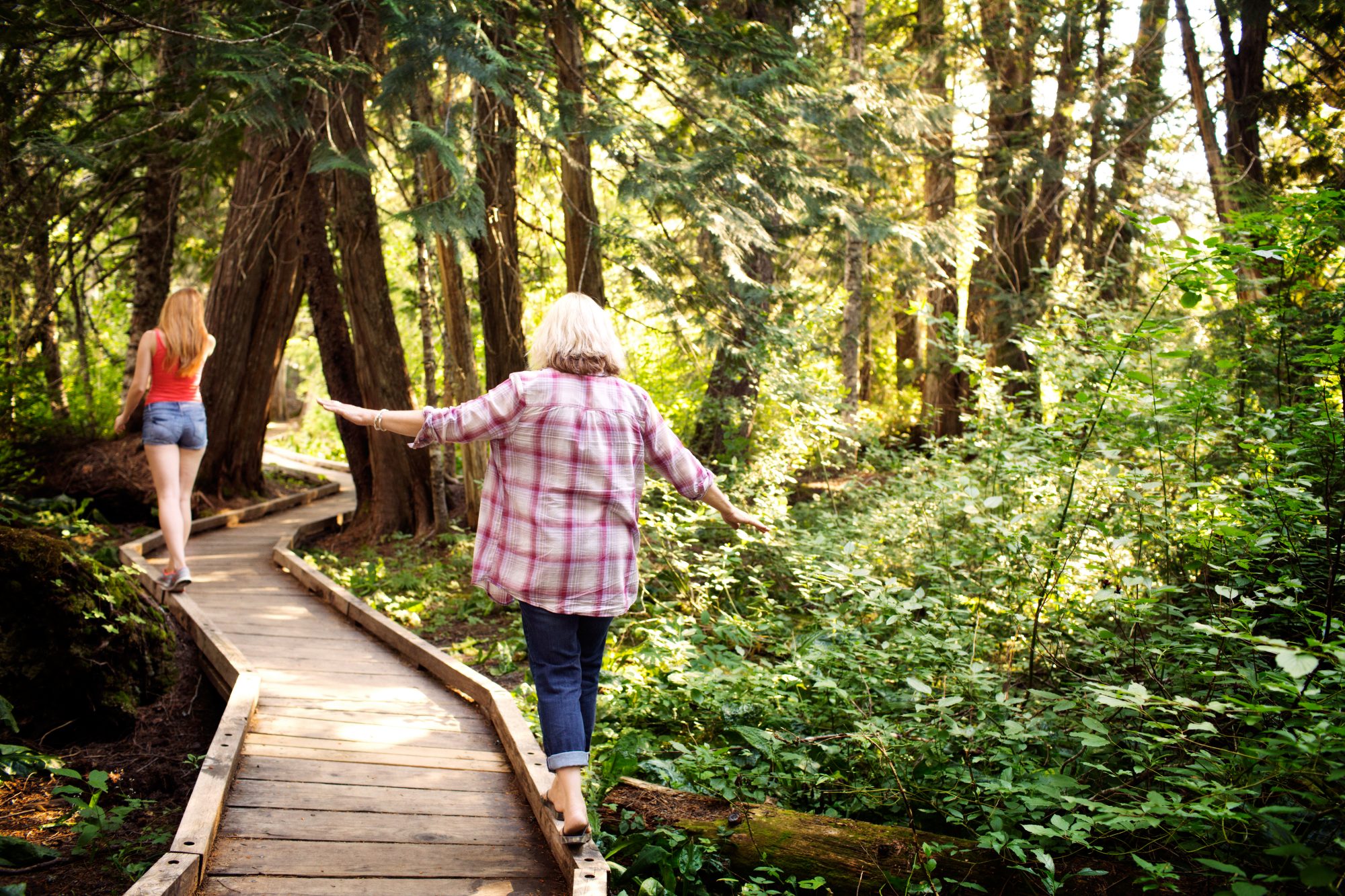 Women walking on a path to represent the gender diversity impacting that Jacki Zehner discusses as part of her philanthropic and investment strategy.